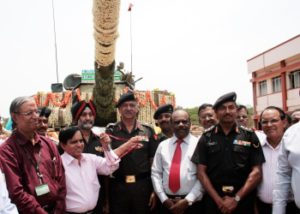 S Chandrasekaradll DGOF (AV) presenting the  key to Lieutenant General Dalip Bhardwaj, DGMF at the handing over ceremony of the Arjun Main Battle Tank at HVF Avadi, Chennai. Dr A Sivathanu Pillai is also present.