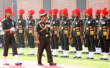 The new Chief of Staff of the Indian Army, General VK Singh inspects a Guard of Honour at South Block in New Delhi on Thursday.