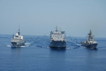 INS Jyoti refuels INS Ranvir and RSNS Intrepid at sea.