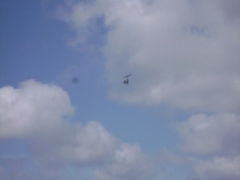DSC02876 A helicopter hovering over the route of the astronaut's bus.