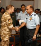 Air_Marshal_LK_Malhotra_of_Eastern_Air_Command_interacting_with_Gp_Capt_John_Hitchcock_team_leder_RAF_during_Ex_Indradhanush_at_Kalaikunda_on_20_Oct_2010 (450 x 510)