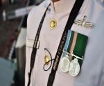 A cadet in dress whites.