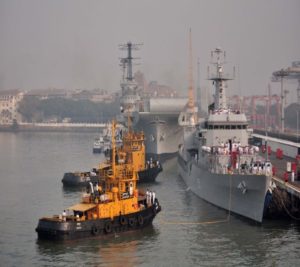 tug Tug, alongside.